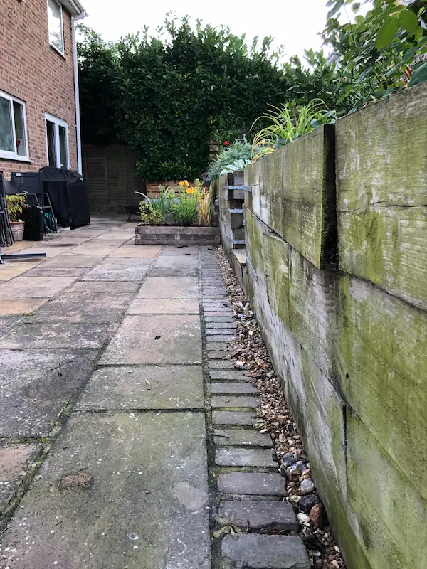 Image of flower bed retaining wall that have been installed