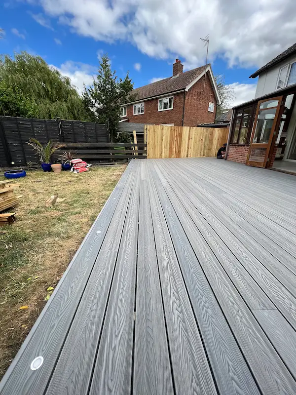 closer up view of grey wooden decking installed for client