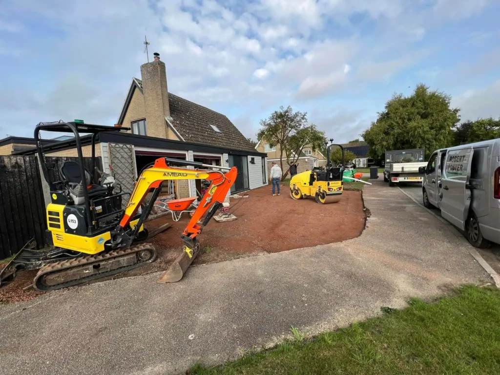Team at Home and Garden installing new driveway for client