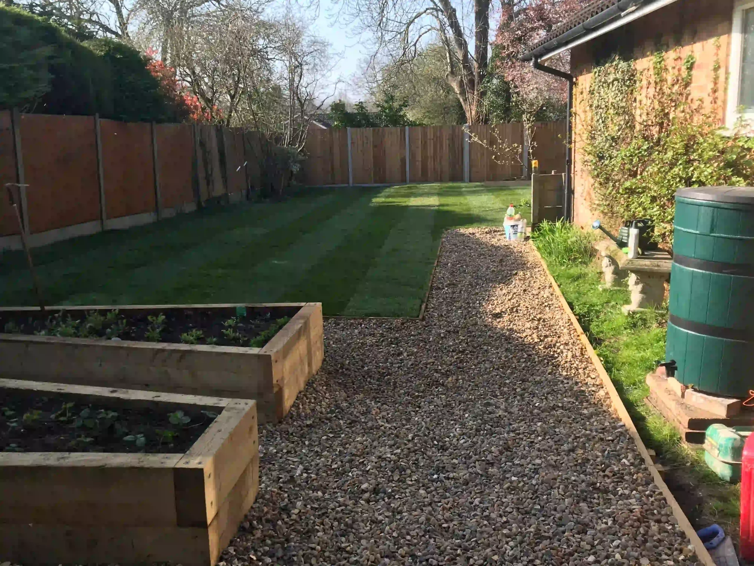 flower beds and garden walkway installed