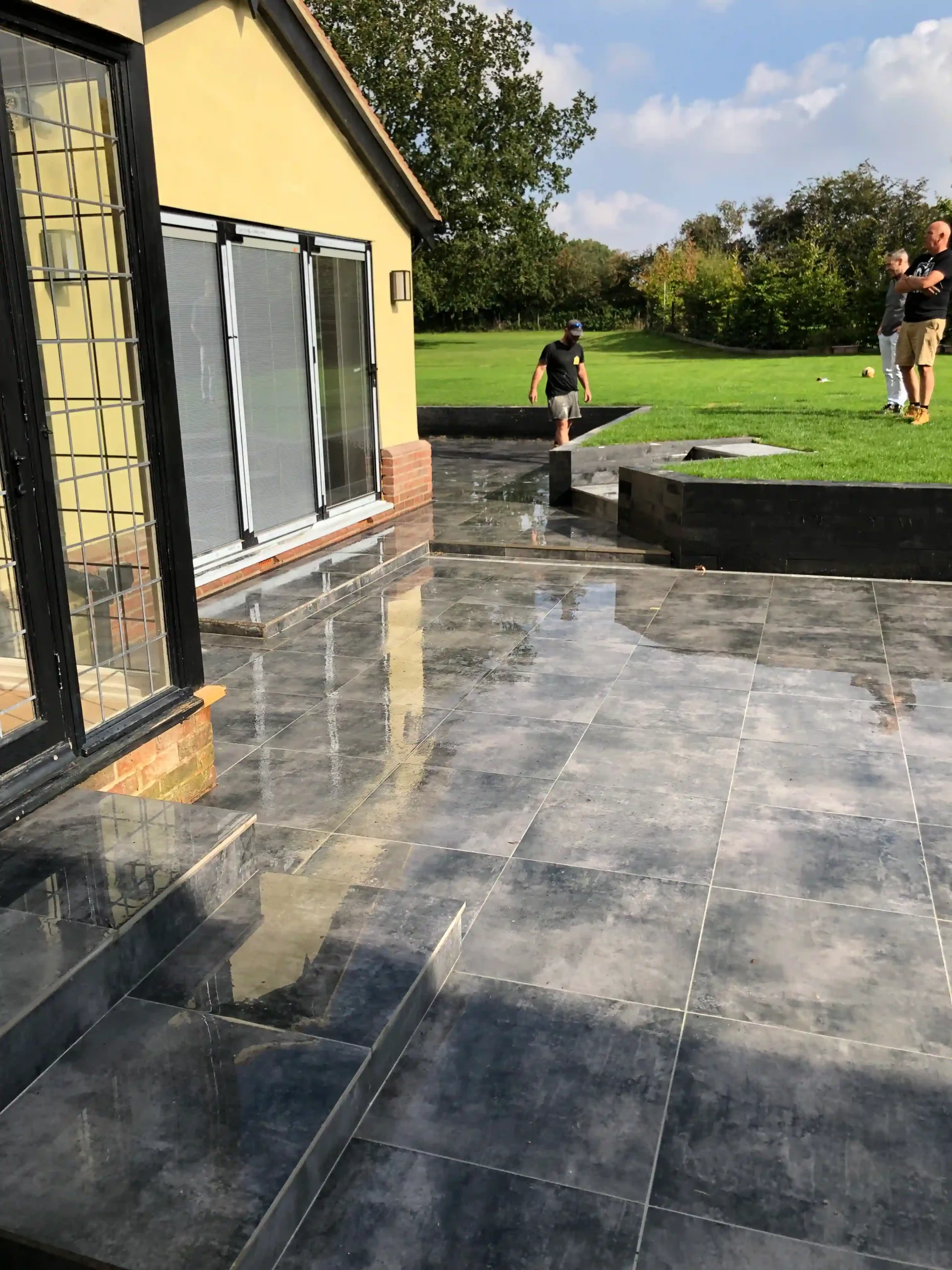 up close image of porcelain patio with gully drains